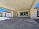 Covered entrance attached to a three-car garage leading to an inviting front door at 1351 Huckleberry St, Pahrump, NV 89048