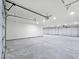 Large four-car garage with ample room for storage at 1351 Huckleberry St, Pahrump, NV 89048