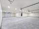 Spacious four-car garage with overhead lighting at 1351 Huckleberry St, Pahrump, NV 89048
