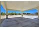 Covered entrance with columns provides an open view and leads to a three-car garage at 1351 Huckleberry St, Pahrump, NV 89048