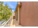 Private outdoor balcony space with metal railings, offering a tranquil view of the neighborhood at 1448 Canyon Ledge Ct, Las Vegas, NV 89117