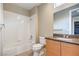 Well-appointed bathroom with tub and shower, vanity with granite countertop, and tile floors at 1448 Canyon Ledge Ct, Las Vegas, NV 89117