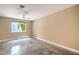 Empty bedroom featuring concrete floors, a window and neutral walls ready for customization at 1448 Canyon Ledge Ct, Las Vegas, NV 89117