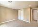 Cozy bedroom featuring neutral walls, carpet flooring, and a closet with double doors at 1448 Canyon Ledge Ct, Las Vegas, NV 89117