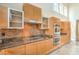 Modern kitchen with stainless steel appliances, stylish backsplash, and ample counter space at 1448 Canyon Ledge Ct, Las Vegas, NV 89117
