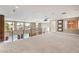 Open loft space overlooking pool area, offering versatile living or entertainment options at 1448 Canyon Ledge Ct, Las Vegas, NV 89117