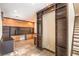 A spacious office with custom shelving and cabinets offers plenty of storage and workspace at 1448 Canyon Ledge Ct, Las Vegas, NV 89117