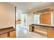 Bright office area with custom desks, large windows, and a modern, minimalist design at 1448 Canyon Ledge Ct, Las Vegas, NV 89117