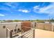 This rooftop view features sleek railings, modern architecture and a beautiful skyline vista at 1448 Canyon Ledge Ct, Las Vegas, NV 89117