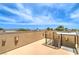 An amazing rooftop shows stairs, and a gorgeous horizon view with blue skies and natural lighting at 1448 Canyon Ledge Ct, Las Vegas, NV 89117