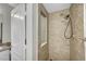 Bathroom featuring a tiled shower with modern showerhead at 1505 Blackcombe St # 202, Las Vegas, NV 89128