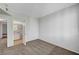 Cozy bedroom features neutral carpet with bathroom at 1505 Blackcombe St # 202, Las Vegas, NV 89128