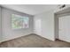 Bedroom with neutral carpet, window, and a closet, great for relaxation at 1505 Blackcombe St # 202, Las Vegas, NV 89128