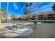 Grassy community area with picnic tables and barbecue grills for outdoor enjoyment at 1505 Blackcombe St # 202, Las Vegas, NV 89128