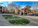 Common park featuring a grassy area, picnic tables, and barbeque grills for residents at 1505 Blackcombe St # 202, Las Vegas, NV 89128