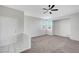 Inviting living room with neutral decor, plush carpeting, and ample natural light from windows at 1505 Blackcombe St # 202, Las Vegas, NV 89128