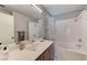 Well-lit bathroom with a tub-shower combo, sleek vanity, and neutral-toned walls for a clean aesthetic at 1523 Silver Point Ave, Las Vegas, NV 89123