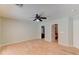 Bedroom with wood floors, a ceiling fan, and an entrance to the bathroom at 1523 Silver Point Ave, Las Vegas, NV 89123