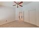 Bedroom with tile floor, a closet, and an entrance to the bathroom at 1523 Silver Point Ave, Las Vegas, NV 89123