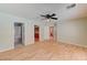 Spacious bedroom with hardwood floors and multiple access points at 1523 Silver Point Ave, Las Vegas, NV 89123