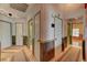 Hallway includes multiple doorways, carpeted runners, and base trim at 1523 Silver Point Ave, Las Vegas, NV 89123