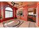 Inviting living room with wood ceiling, a decorative floor inlay, and views to other living spaces at 1523 Silver Point Ave, Las Vegas, NV 89123