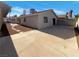 A large concrete patio in the backyard offers ample space for outdoor entertaining and relaxation at 1832 Yellow Rose St, Las Vegas, NV 89108