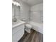 Clean, bright bathroom with white fixtures and a modern vanity at 1832 Yellow Rose St, Las Vegas, NV 89108