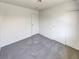 Bedroom with gray carpet, closet, and natural light at 1832 Yellow Rose St, Las Vegas, NV 89108