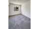 Bedroom with gray carpet and natural light at 1832 Yellow Rose St, Las Vegas, NV 89108