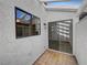 Private outdoor patio with concrete block wall and sliding glass door at 1832 Yellow Rose St, Las Vegas, NV 89108