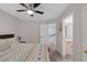 This bedroom offers natural light and convenient access to the bathroom and hallway at 1921 Spyglass Dr, Henderson, NV 89074
