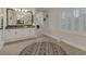 This main bathroom features a vanity with a large mirror with views into the bed and bathroom areas at 1921 Spyglass Dr, Henderson, NV 89074