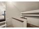 Finished attic space features carpeted flooring, and rustic wood trim at 1951 Jim Haworth Ct, Logandale, NV 89021
