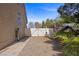 Fully fenced backyard providing privacy, and parking for recreational vehicle at 1951 Jim Haworth Ct, Logandale, NV 89021