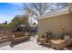 Inviting backyard patio with a built in spa, outdoor seating, and grill perfect for entertaining at 1951 Jim Haworth Ct, Logandale, NV 89021