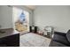 Well lit room with large window, neutral decor and furniture creating a cozy and inviting atmosphere at 1951 Jim Haworth Ct, Logandale, NV 89021