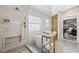 Bright bathroom with a soaking tub, glass-enclosed shower, and modern fixtures and tile at 211 Kokopelli Ct, Henderson, NV 89074