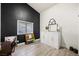 Office featuring a black accent wall, lots of natural light, and built in storage at 211 Kokopelli Ct, Henderson, NV 89074