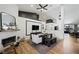 Inviting living area with a fireplace and entertainment center providing a comfortable gathering space at 211 Kokopelli Ct, Henderson, NV 89074
