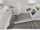 Open entryway featuring stairs and plentiful natural light from modern windows at 2306 Jared Ct, North Las Vegas, NV 89032