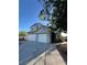 Charming two-story home with a two-car garage, extended driveway, and well-maintained landscaping at 2306 Jared Ct, North Las Vegas, NV 89032