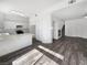 Bright and spacious living area flows into a kitchen with a breakfast bar at 2306 Jared Ct, North Las Vegas, NV 89032