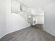 Inviting living room featuring high ceilings, modern staircase, and a fireplace at 2306 Jared Ct, North Las Vegas, NV 89032
