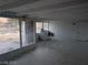 Bright sun room with large windows, a washing machine and access to the backyard at 255 S 17Th St, Las Vegas, NV 89101