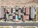 Bird's-eye view of the property highlighting the backyard pool and solar panels on rooftops at 2578 Skylark Trail St, Henderson, NV 89044