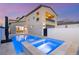 Inviting backyard features a sparkling pool and spa, perfect for relaxation and entertainment at 2578 Skylark Trail St, Henderson, NV 89044