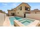 Beautiful backyard boasts a sparkling pool and spa, perfect for summer relaxation and entertaining at 2578 Skylark Trail St, Henderson, NV 89044