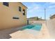 Backyard featuring a modern pool and spa with ample patio space for outdoor enjoyment at 2578 Skylark Trail St, Henderson, NV 89044