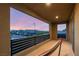 Relaxing balcony view with a colorful hammock and a beautiful street view at 2578 Skylark Trail St, Henderson, NV 89044